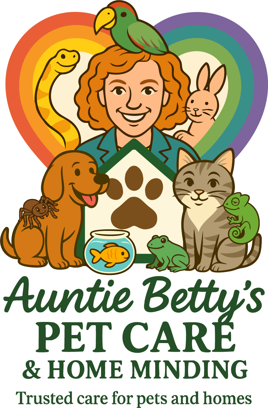 Auntie Betty’s Pet Care and Home Minding logo, with a smiling woman surrounded by pets, a rainbow heart, and dark green lettering.